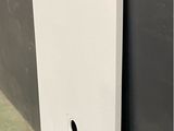 an image of a white door with a hole in it