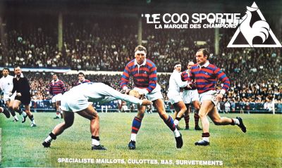 a lot of rugby players playing a game on the field