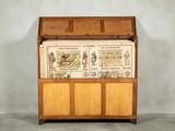 a wooden chest with an open lid on it