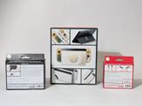 two nintendo wii controllers and a box of nintendo wii controllers