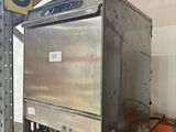 an image of a commercial oven in a warehouse