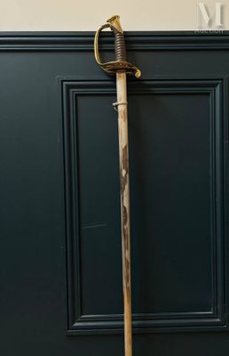a cane that is leaning up against a wall