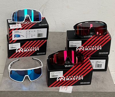 several pairs of sunglasses are on display in a display case