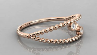 a close up of two rings with diamonds on them