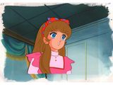 an image of a girl in a pink dress with a bow on her head