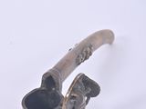 a pipe that is sitting on top of a table