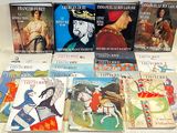 a lot of books that are sitting on a table