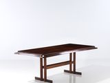 the table is made of wood and has a rectangular top