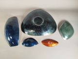 five different types of stones on a white surface