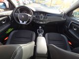 the interior of a car with a steering wheel and a dash board