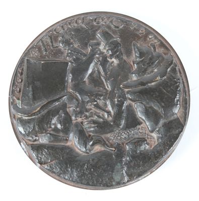 une pièce d'argent sur laquelle figure l'effigie d'un homme à cheval
