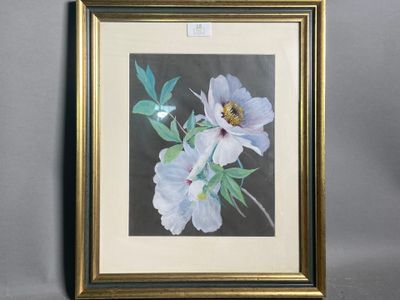 painting of a white flower in a gold frame on a gray background
