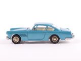 a toy car that is sitting on a white surface