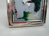 a picture of a picture of a man and a woman in a picture frame