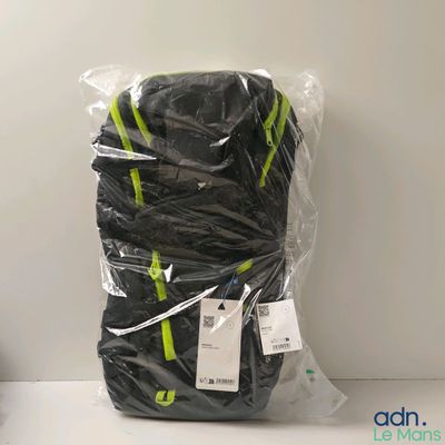 a bag of luggage that is wrapped up and ready to be packed
