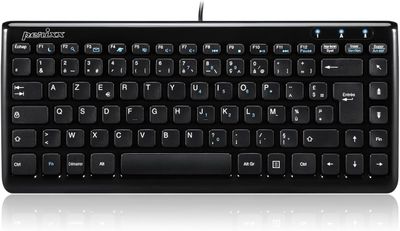 un gros plan d'un clavier d'ordinateur posé sur une surface blanche