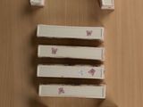 a picture of a letter e on a wooden surface