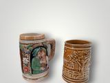 two mugs sitting next to each other on a table