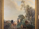 une peinture à l'huile représentant des vaches dans un pâturage près d'un arbre