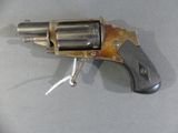 a gun that is sitting on a table