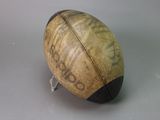 a ball with writing on it sitting on a table