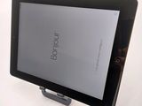 an image of a tablet computer sitting on top of a white table