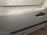 a white car with a door handle on it