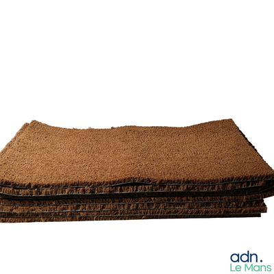 a pile of brown carpet on a white background