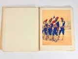 an open book with a picture of a group of soldiers on it