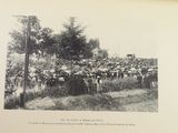 a black and white photo of a large crowd of people
