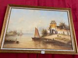 la photo d'un tableau accroché à un mur rouge