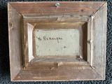 an old picture of a picture of a wooden frame with writing on it