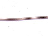 a white pearl on a stick on a white surface