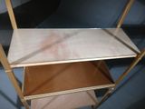 a shelf that has a glass top on it