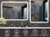 a picture of a bathroom with a large mirror above the sink