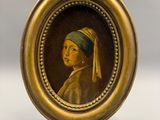 Portrait d'une jeune fille à la boucle d'oreille de perle