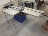 une image d'une scie à table dans un atelier