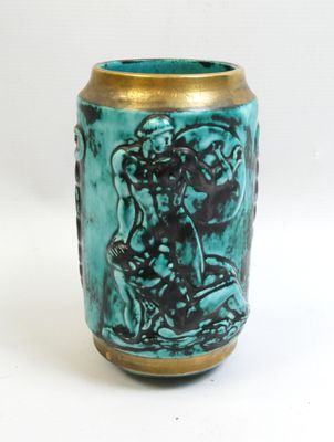 a green vase with a gold rim and a picture of a man riding a horse