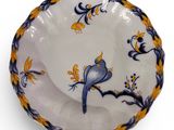 an image of a plate with a bird on it