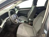 the interior of a car with a steering wheel and a dashboard