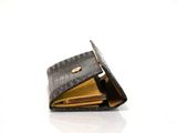 a black wallet with a gold coin inside of it