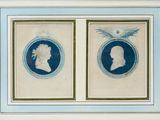 two framed blue and white portraits of two men