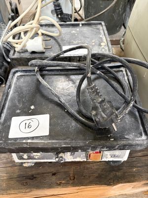 a black box that has some wires on top of it