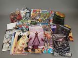 a lot of comic books sitting on a table