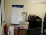 a picture of a room with a printer and a projector
