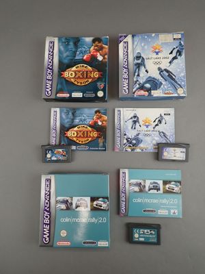 many video games that are sitting on a table