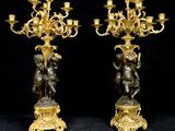 pair of antique bronze figurines of cherenshes and cherenshes on pedestals