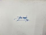 a piece of paper with writing on it on a table