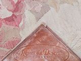 a close up of a purse with a label on it