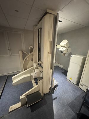 a room with a machine and a chair in it